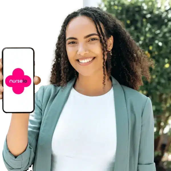 Happy nurse in street clothes holding a phone with NurseIO app